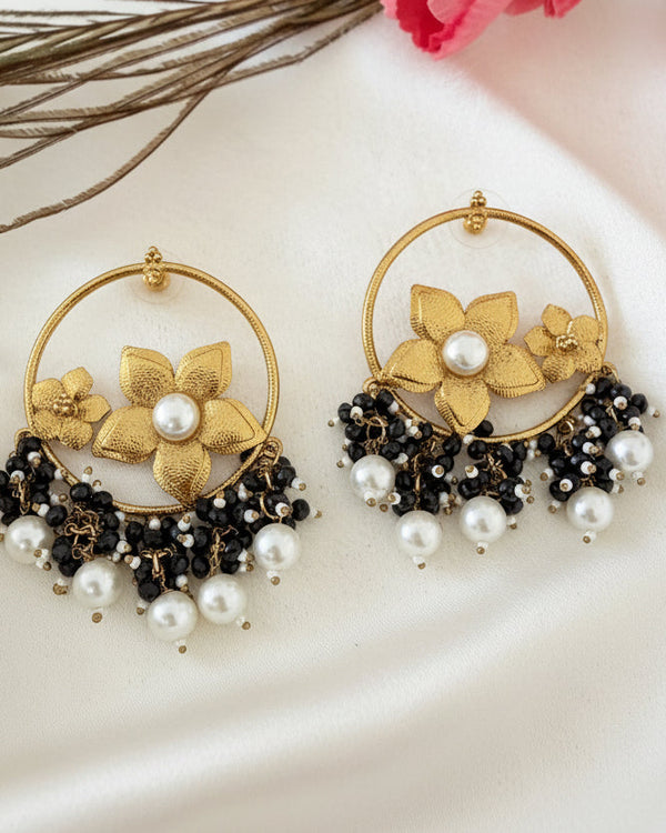 Inaya Golden And Black Hoops Earrings